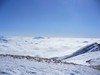 Qualche cima qua e là sbuca dal mare di nebbia.